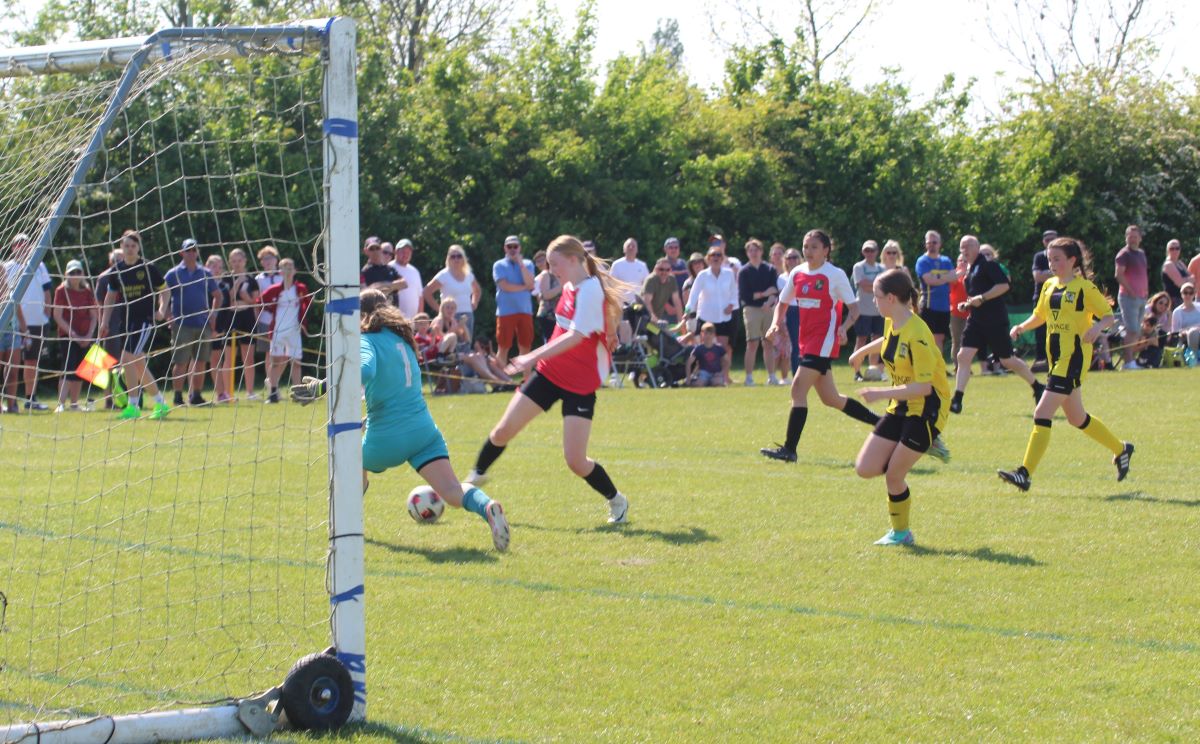 Girls U13 Cup Final Waveney Lionesses red Debenham LC yellow May 2024 1