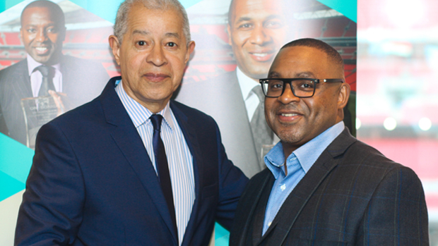 Head of the On The Board programme Karl George MBE (right) poses with Lord Ouseley